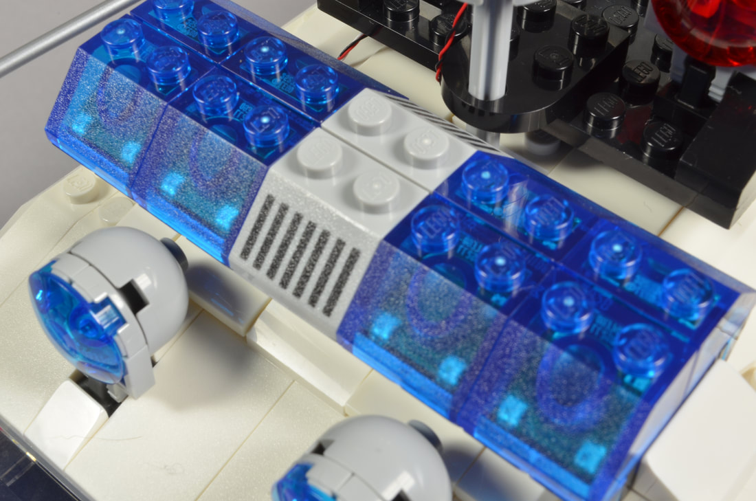 Topside lightbar view of the LEGO Creator Ecto-1 (set #10274) with Brickstuff light kit installed.